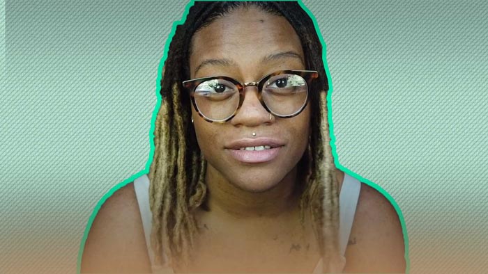 Photo of a dimly lit room with a computer interface terminal.