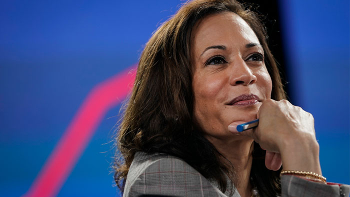 Photo of a dimly lit room with a computer interface terminal.
