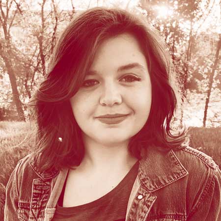 Photo of a dimly lit room with a computer interface terminal.