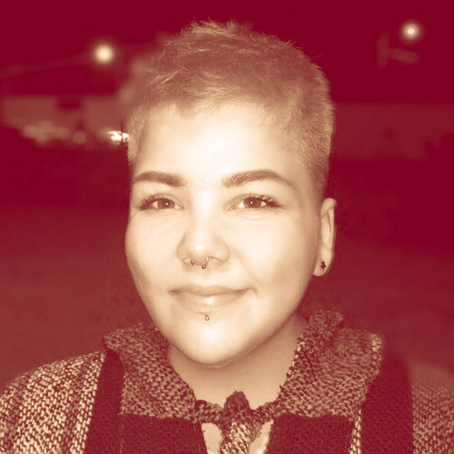 Photo of a dimly lit room with a computer interface terminal.