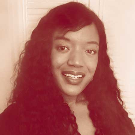 Photo of a dimly lit room with a computer interface terminal.