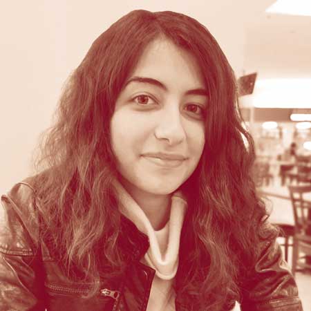 Photo of a dimly lit room with a computer interface terminal.