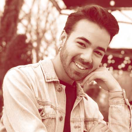 Photo of a dimly lit room with a computer interface terminal.